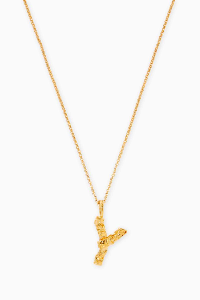 Shop Chloé Gold Alphabet Pendant Necklace in Brass for Women 